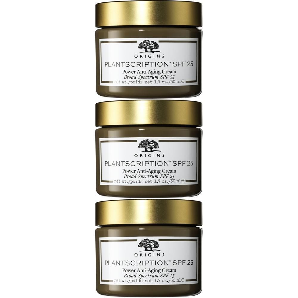 Drie potjes Origins Plantscription SPF 25 Anti-Aging Crème, bruine potjes met gouden deksels.