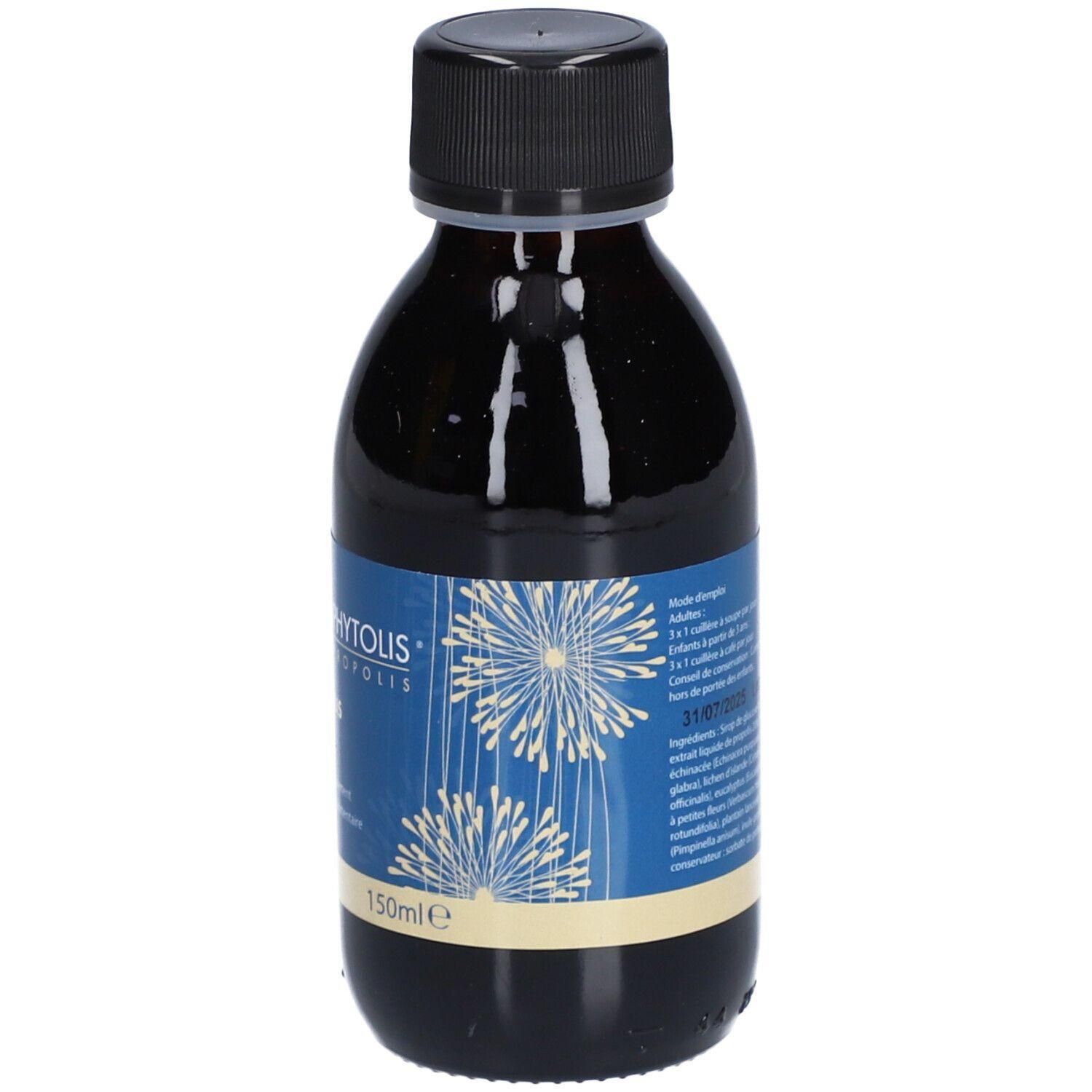 Donkerglazen fles met zwarte schroefdop, blauw-wit gelabeld met decoraties en productinformatie.