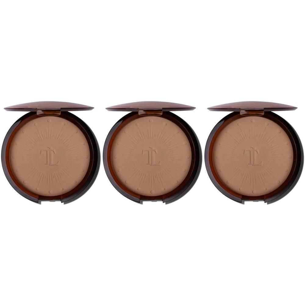 Drie bronzing poeders in ronde doosjes met spiegels.