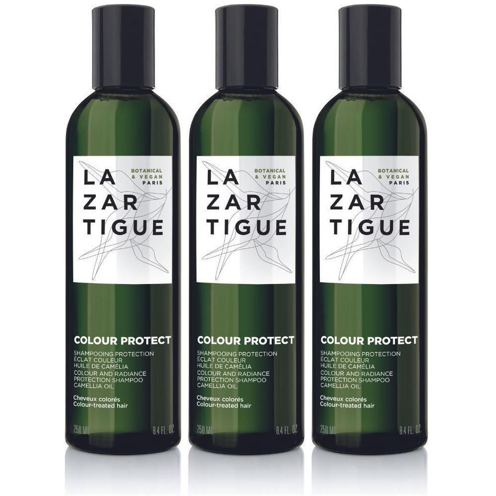 Drie flessen LAZARTIGUE Colour Protect Shampoo met cameliaolie. Groene flessen met zwarte doppen en witte etiketten.