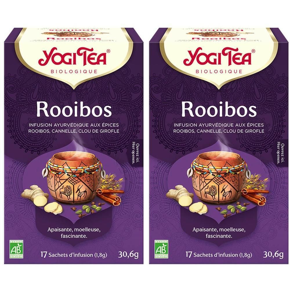 Twee pakken Yogi Tea Rooibos biologisch, met afbeelding van een kopje en ingrediënten zoals gember en kaneel.