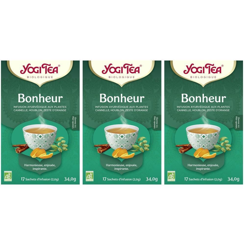 Trois paquets de Yogi Tea Bonheur infusion ayurvédique aux plantes avec cannelle, cardamome et zeste d'orange.