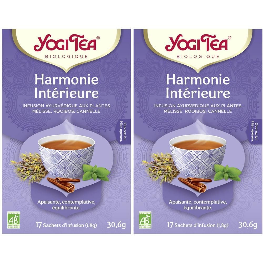 Yogi Tea Harmonie Intérieure emballage de tisane biologique avec deux paquets, chacun montrant une tasse de thé, des bâtons de cannelle et des herbes.