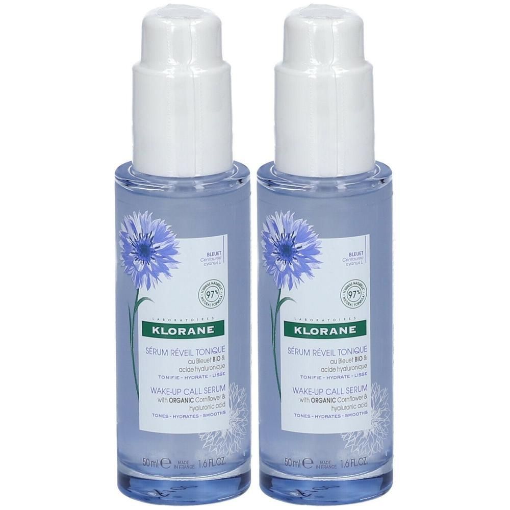 Twee Klorane BIO Korenbloem serums met hyaluronzuur. Heldere vloeistof in pompflesjes.
