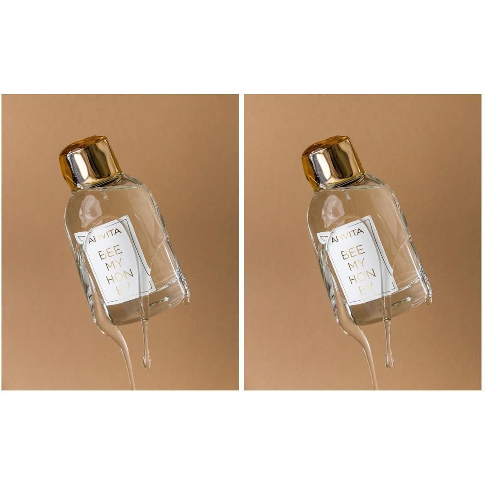 Bouteille Apivita Bee My Honey Eau de Toilette avec bouchon doré, dégoulinant de miel.