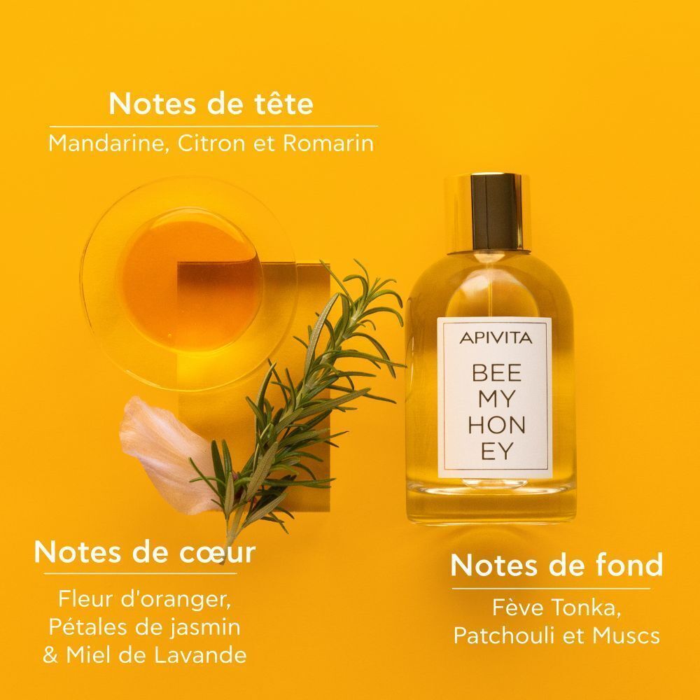 Flacon Apivita Bee My Honey Eau de Toilette avec romarin et pétales de fleurs.