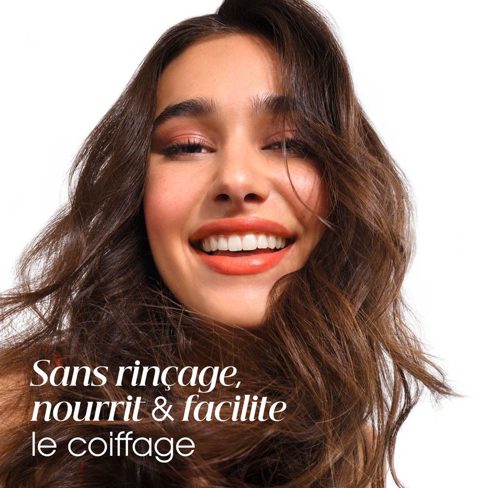 Texture huileuse, biphasée et aérienne de l'Huile Nutrition Mangue Klorane.