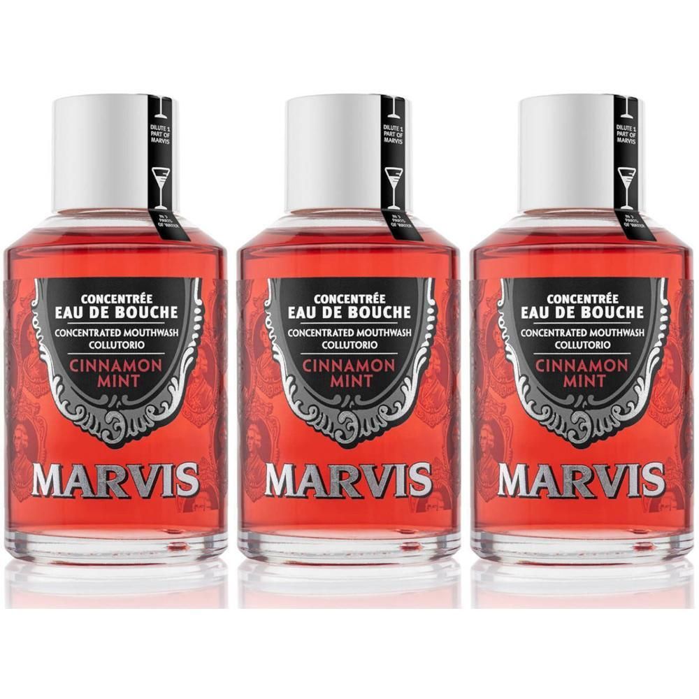 Trois flacons de concentré de bain de bouche MARVIS Cannelle-Menthe, liquide rouge, bouchons argentés.