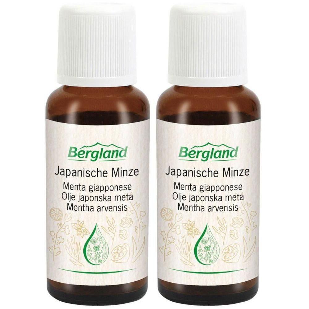 Twee flessen Bergland Japanse muntolie met witte schroefdoppen en etiketten.
