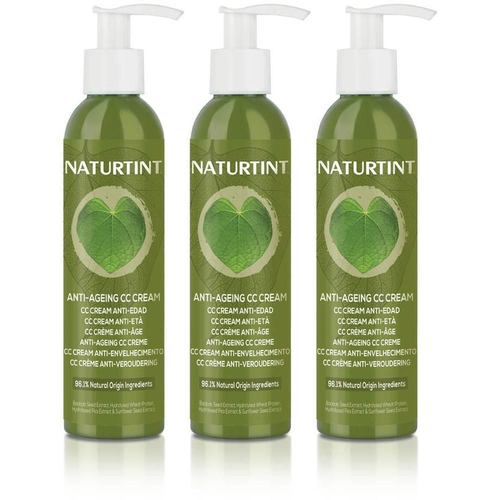 Trois flacons pompe verts Naturtint CC Cream Anti-Aging avec motif de feuille.