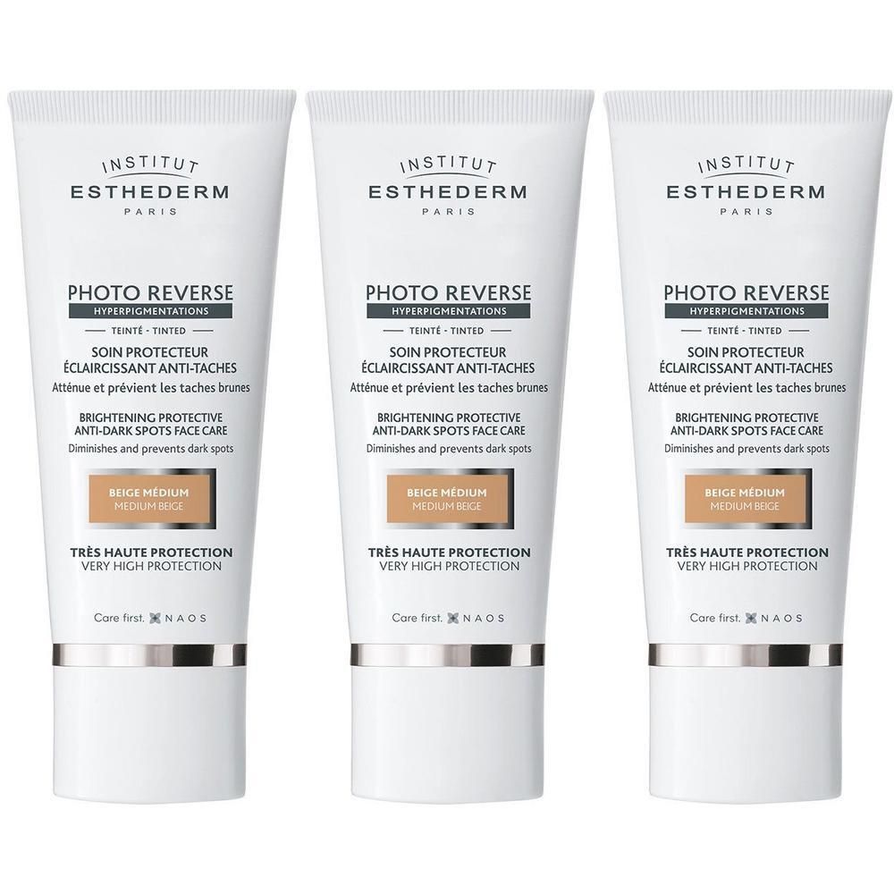 Trois tubes Institut Esthederm Photo Reverse Beige Medium à très haute protection.