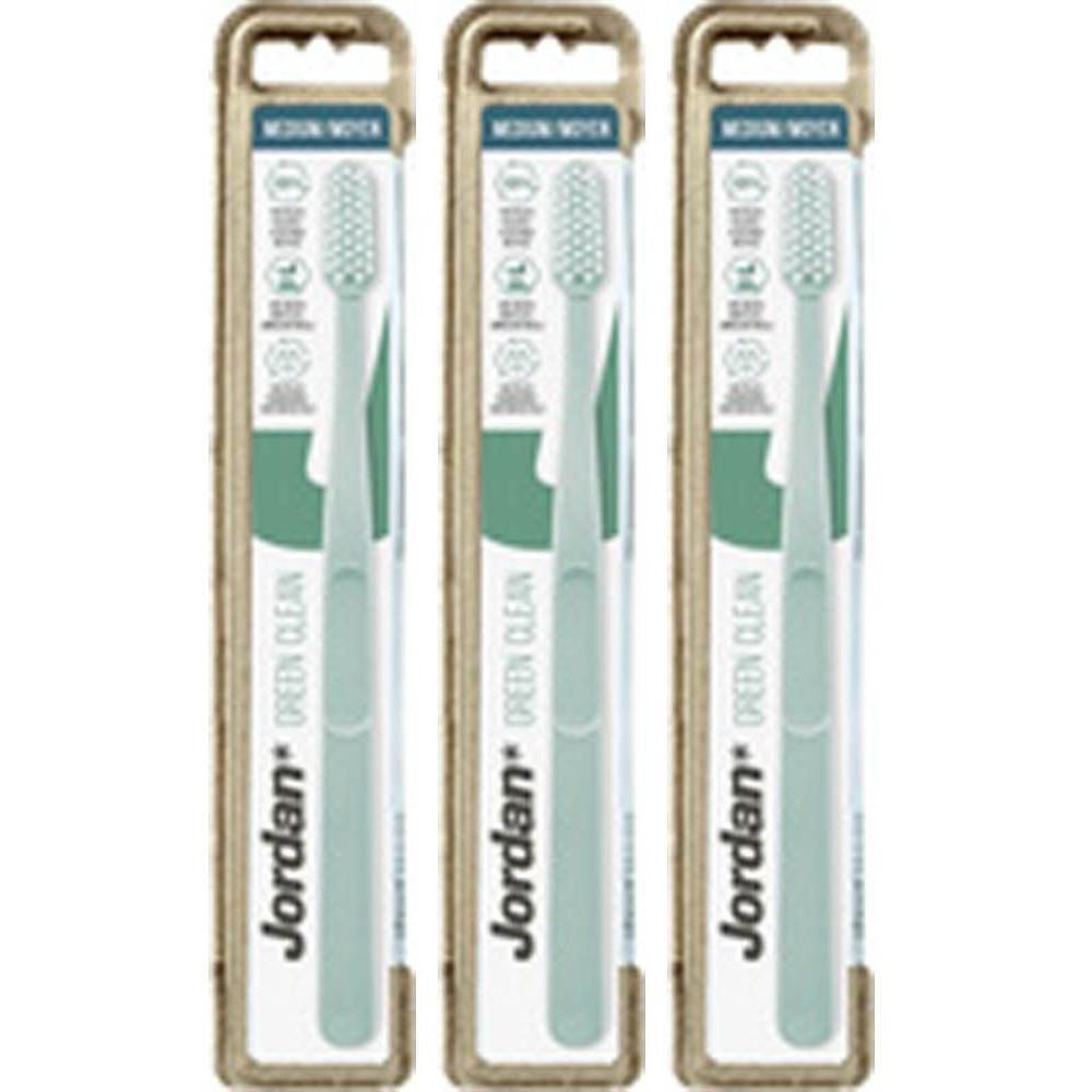 Drie Jordan Green Clean Medium tandenborstels in individuele verpakking.
