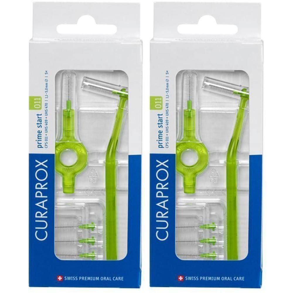 Deux paquets de brosses interdentaires Curaprox Prime Start 011 vertes. Chaque paquet contient une brosse avec manche et capuchon, plus trois brosses de rechange.