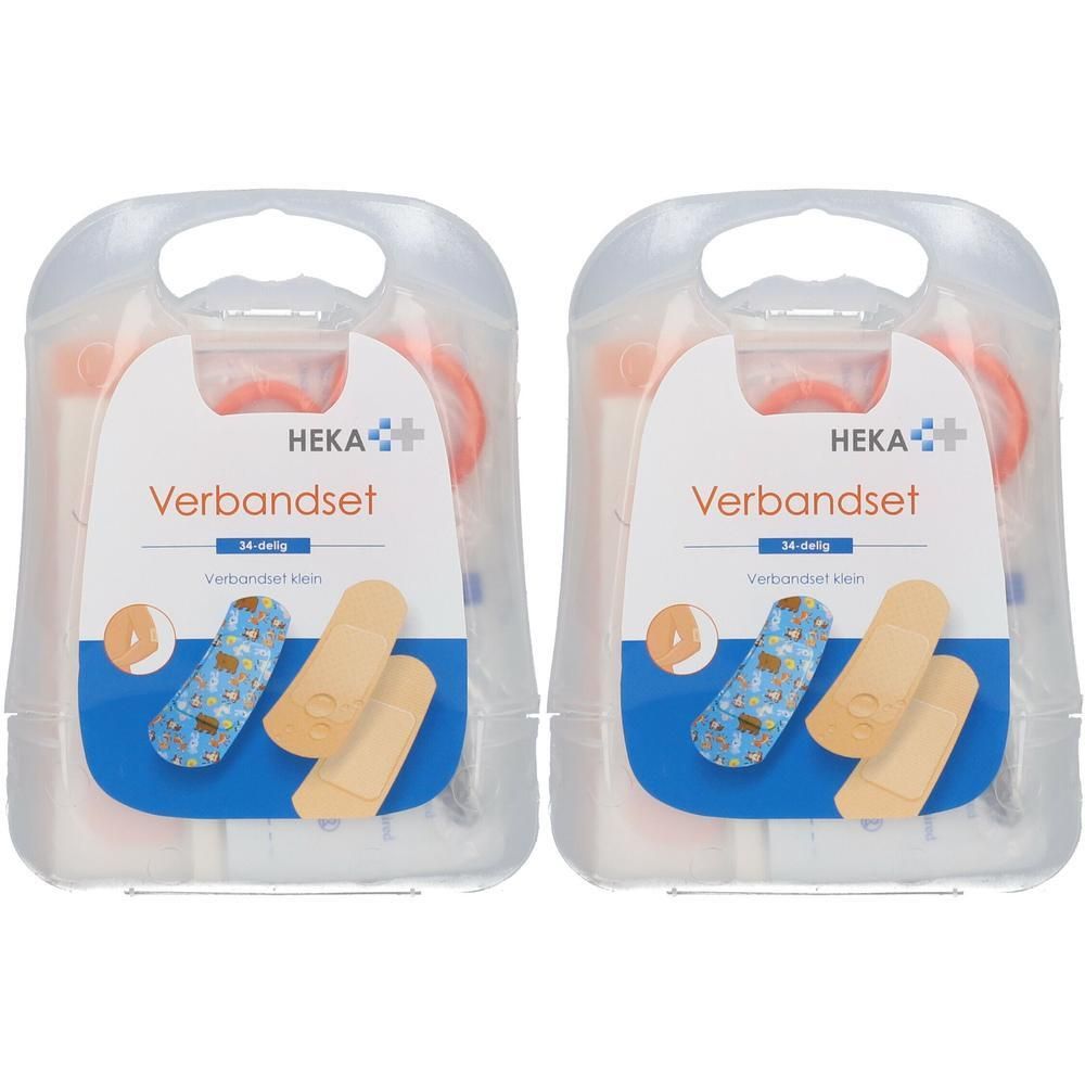 Deux trousses de premiers secours HEKA contenant des pansements et du matériel de bandage dans des boîtiers en plastique transparent.