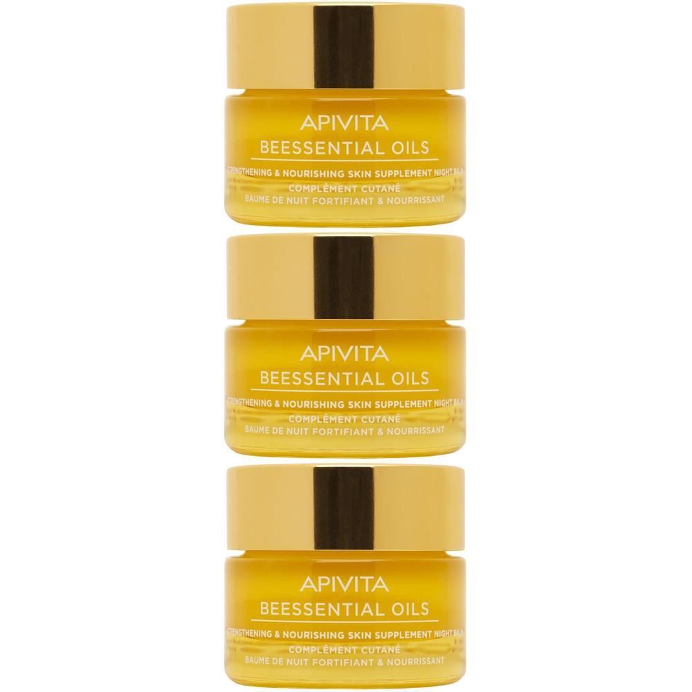 Trois pots de baume de nuit Apivita Beessential Oils.