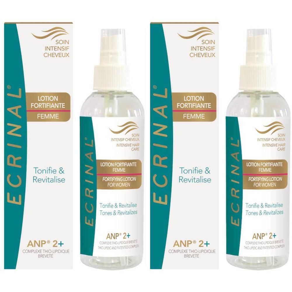 Deux flacons de Lotion Ecrinal ANP2+ Femme avec leurs boîtes. Liquide clair dans des flacons pulvérisateurs transparents.
