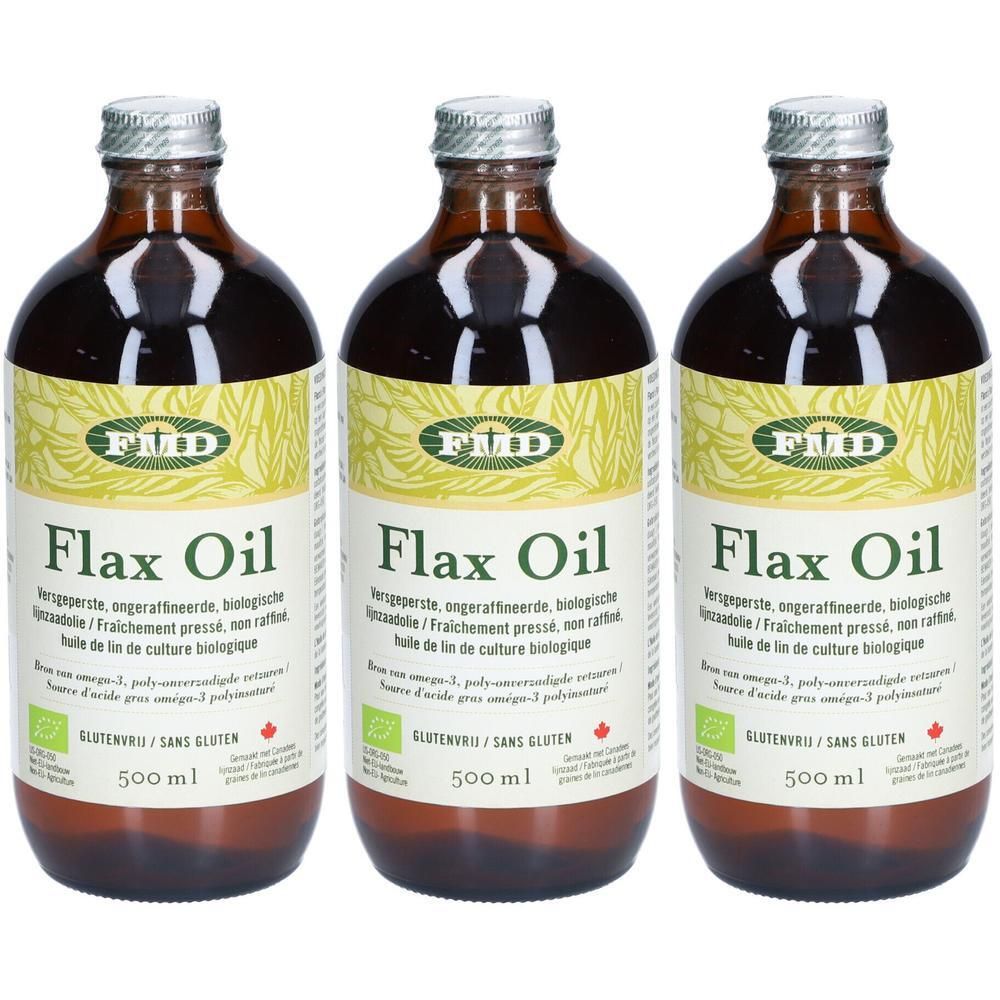Drie flessen FMD Lijnzaadolie, elk 500 ml, met biologische en glutenvrije keurmerken.