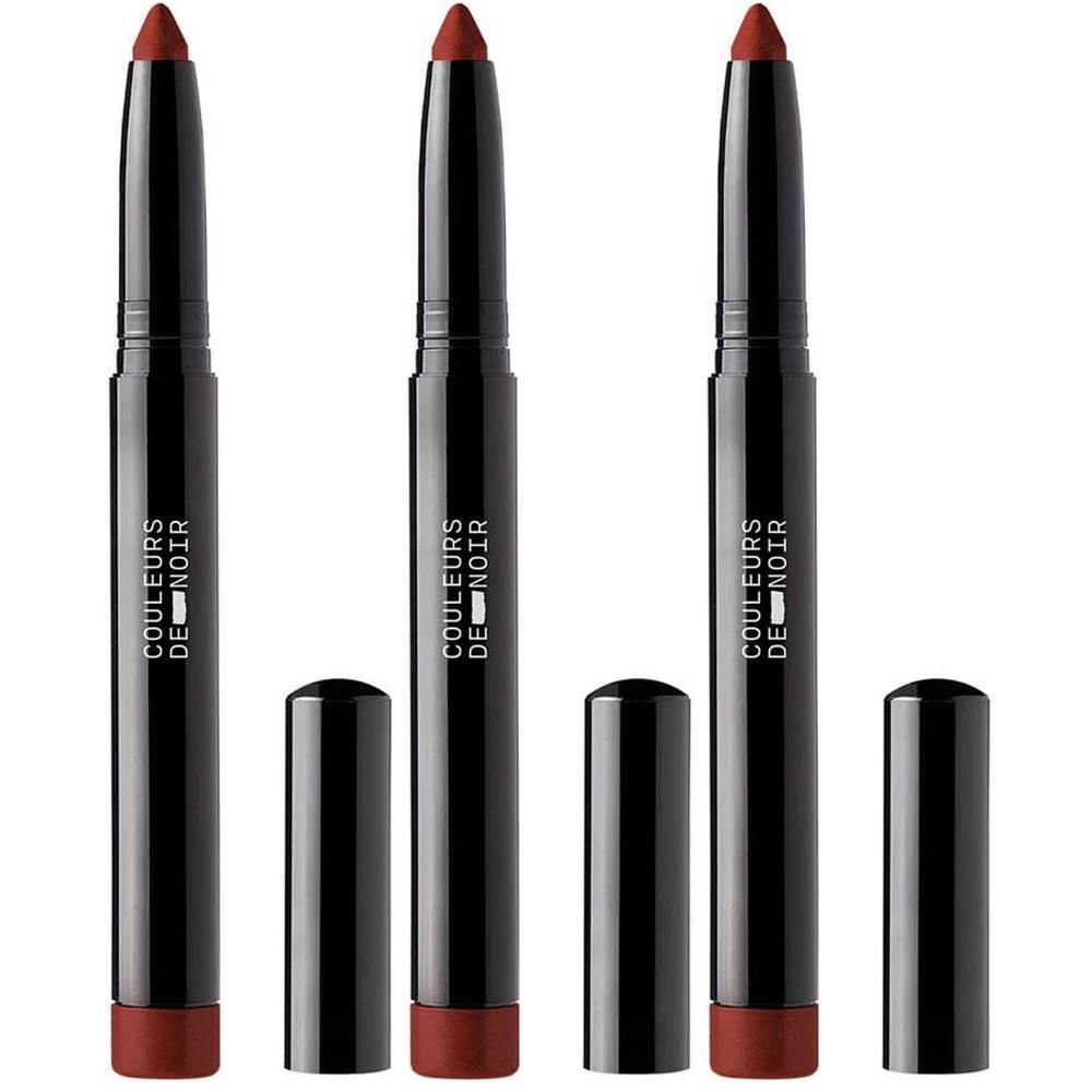 Drie zwarte lippenstiften met rode dopjes en opschrift 'COULEURS DE NOIR'.