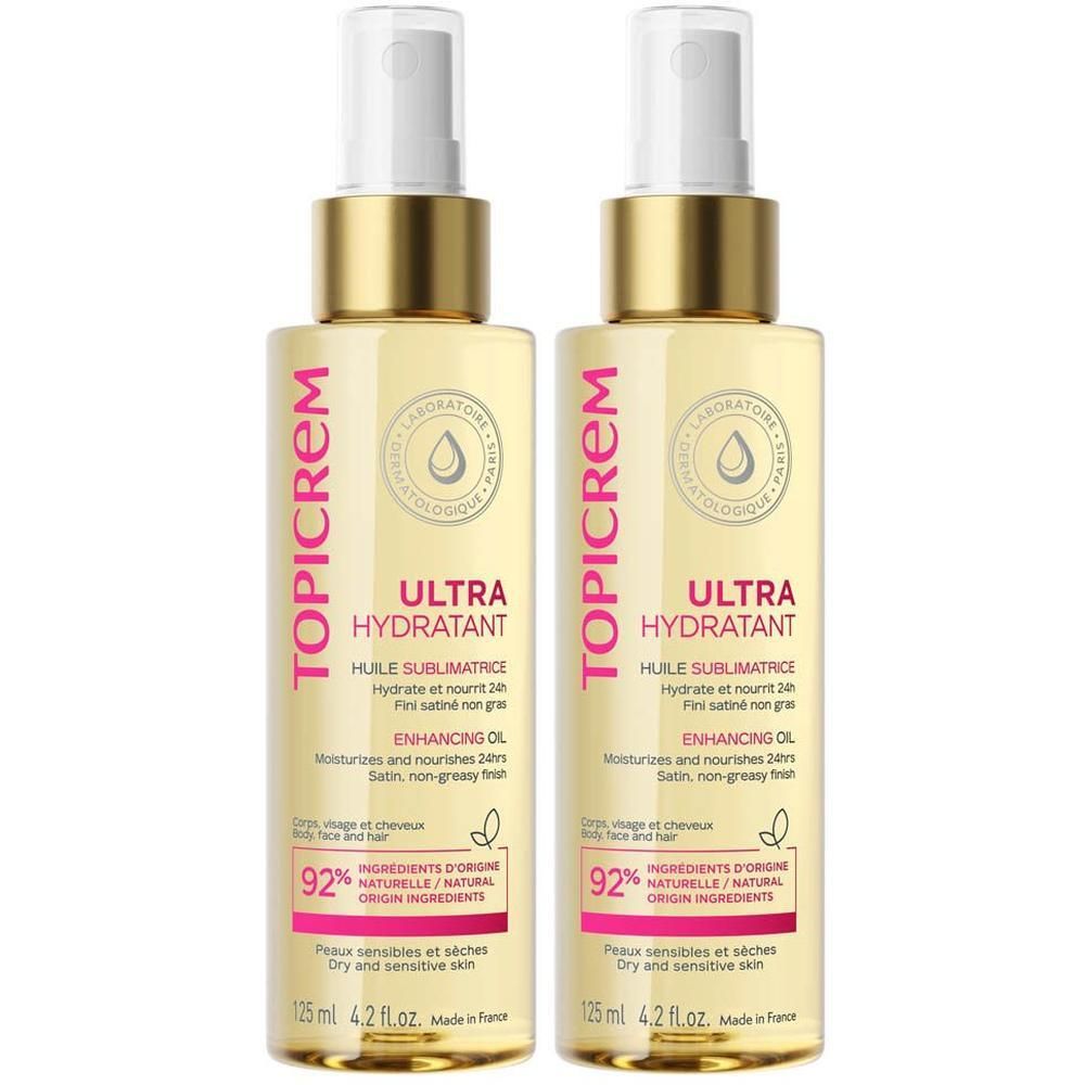 Twee flacons Topicrem Ultra Hydratant Enhancing Oil, 125ml.