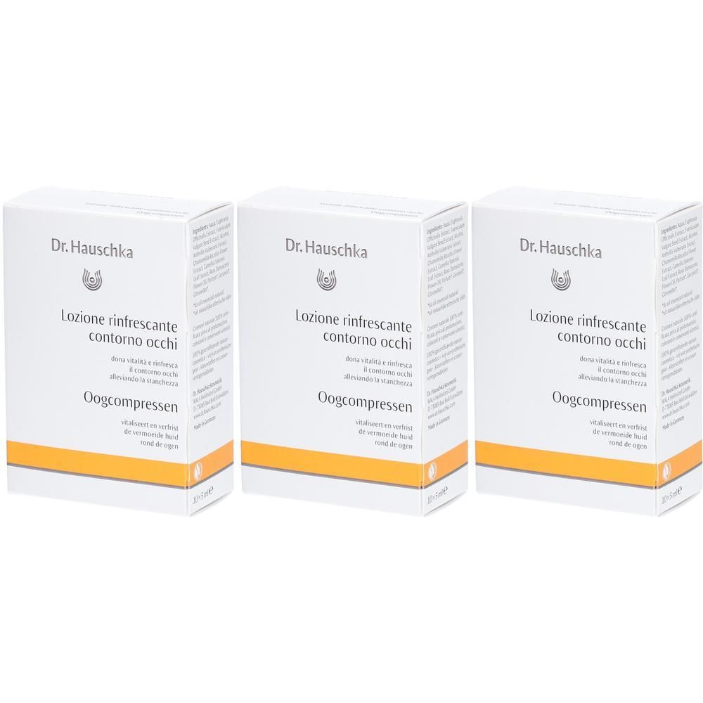 Trois boîtes de Dr. Hauschka Lotion Fraîcheur pour les Yeux, emballage blanc avec bande jaune.
