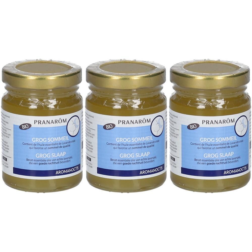 Drie potjes Pranarôm Grog Sommeil Bio met gouden deksels. Blauwe etiketten met productinformatie.