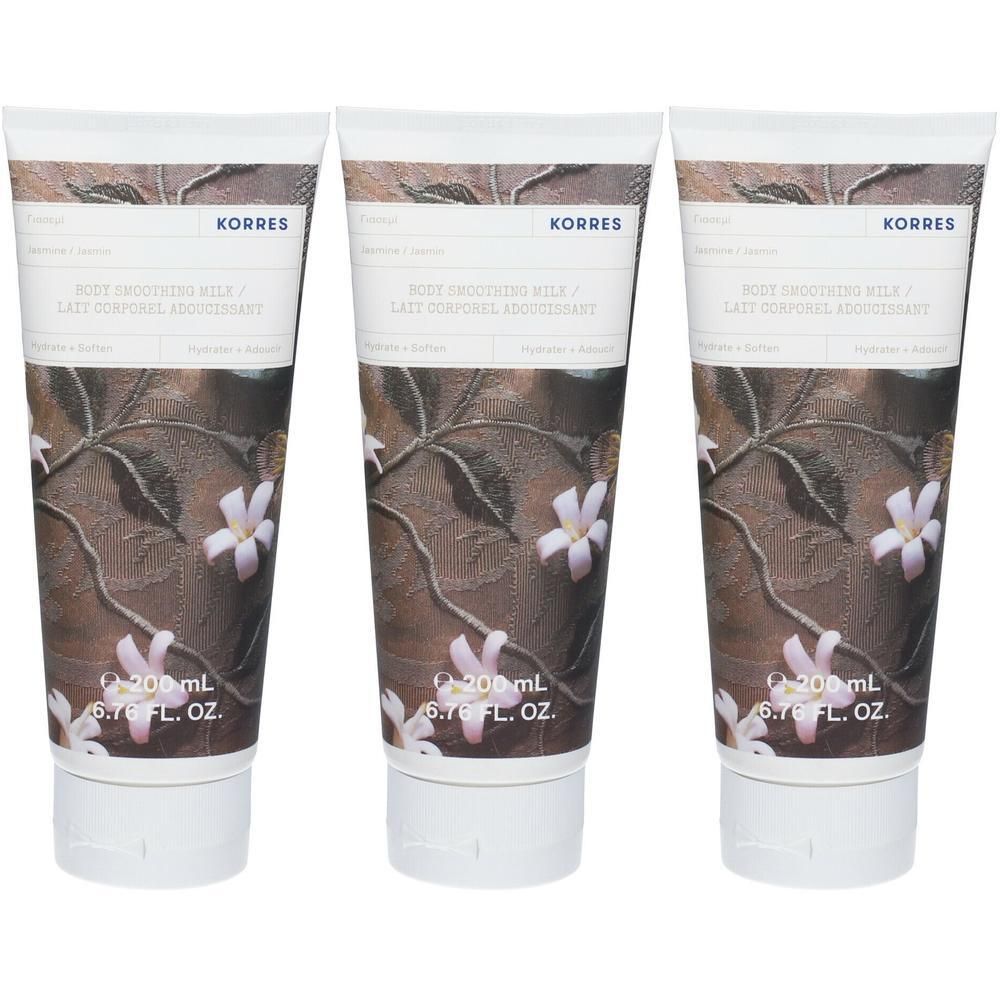 Drie Korres Jasmin Body Smoothing Milk tubes met bloemenpatroon en jasmijnbloesems.