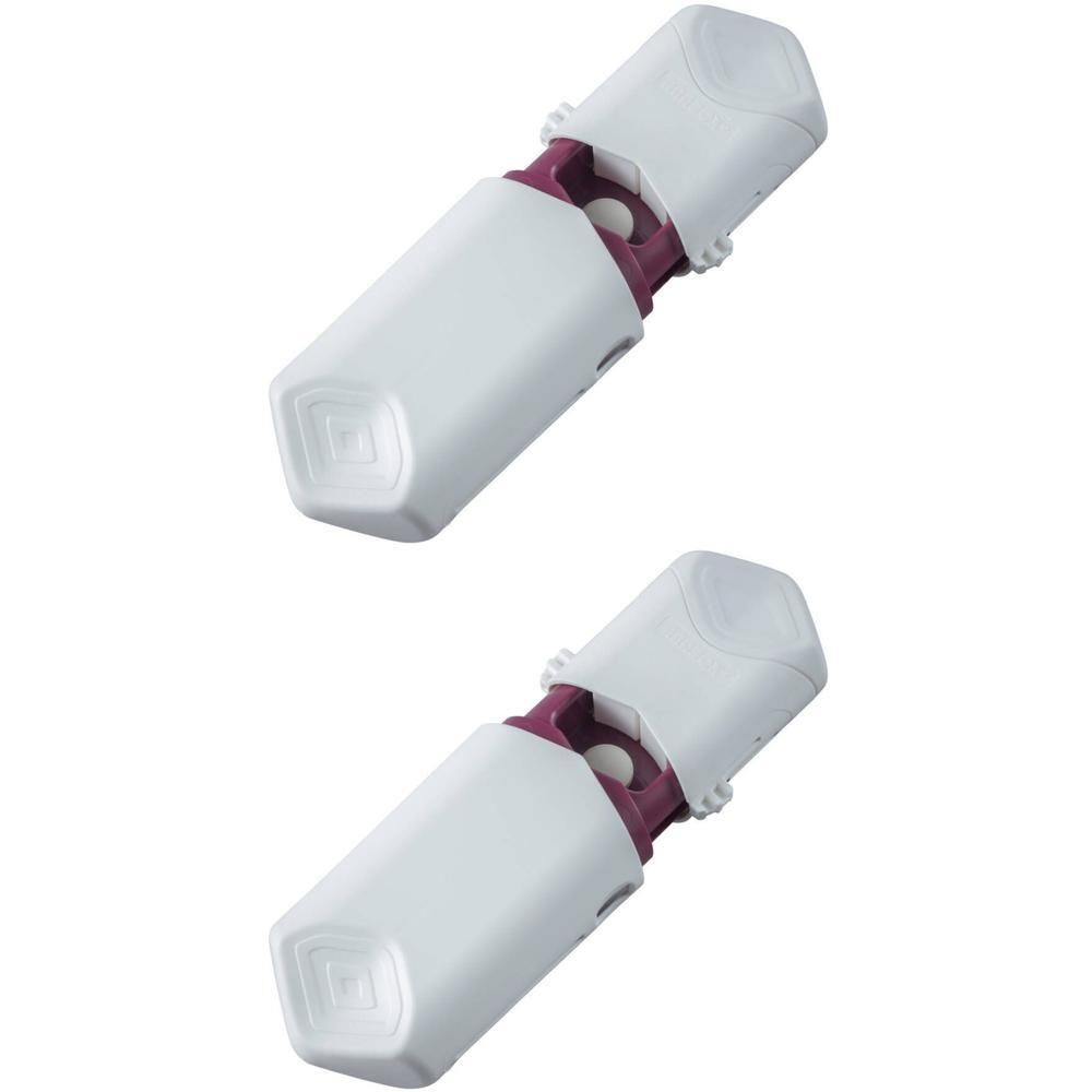 Deux piluliers blancs avec des accents violets, sur fond blanc.