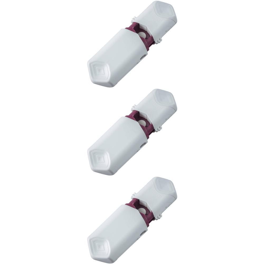 Drie witte pillendoosjes met paarse accenten, vierkante bodem en afgeronde dop.