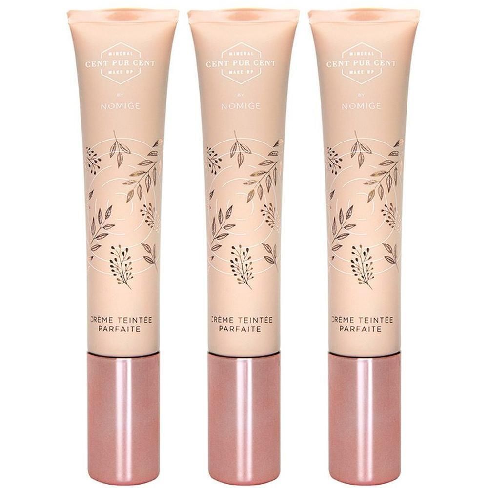 Drie tubes Cent Pur Cent CC Cream met roségouden doppen en bladerpatroon.