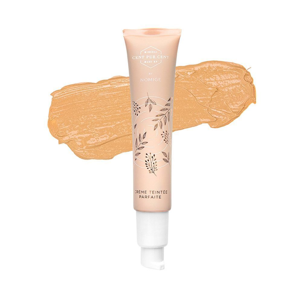 Een tube Cent Pur Cent CC Cream met een veeg van de getinte crème.