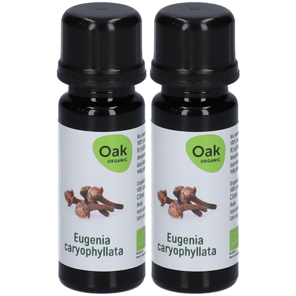Twee flesjes Oak Organic Eugenia caryophyllata biologische etherische olie. Afbeelding van kruidnagel en bio-keurmerk.