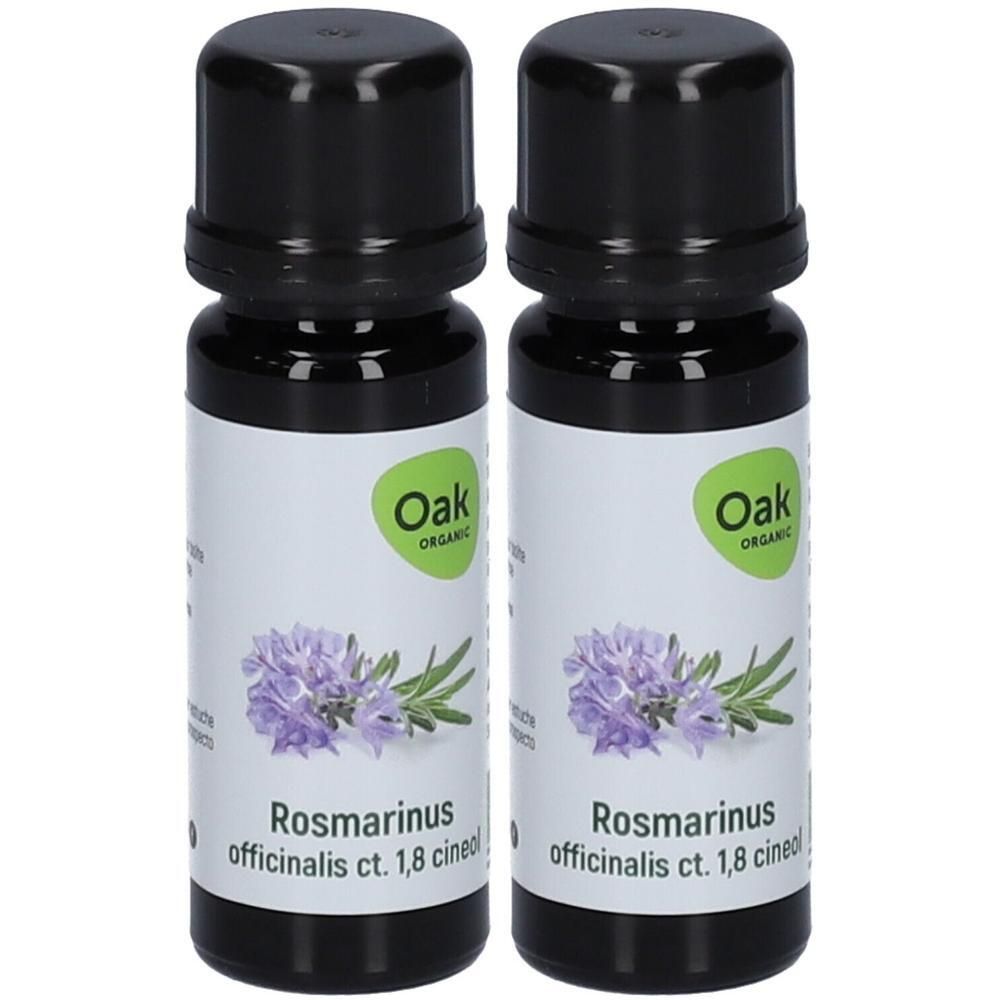 Deux flacons d'huile essentielle de romarin Oak Organic ct. 1,8 cinéole, illustration de fleurs de lavande.