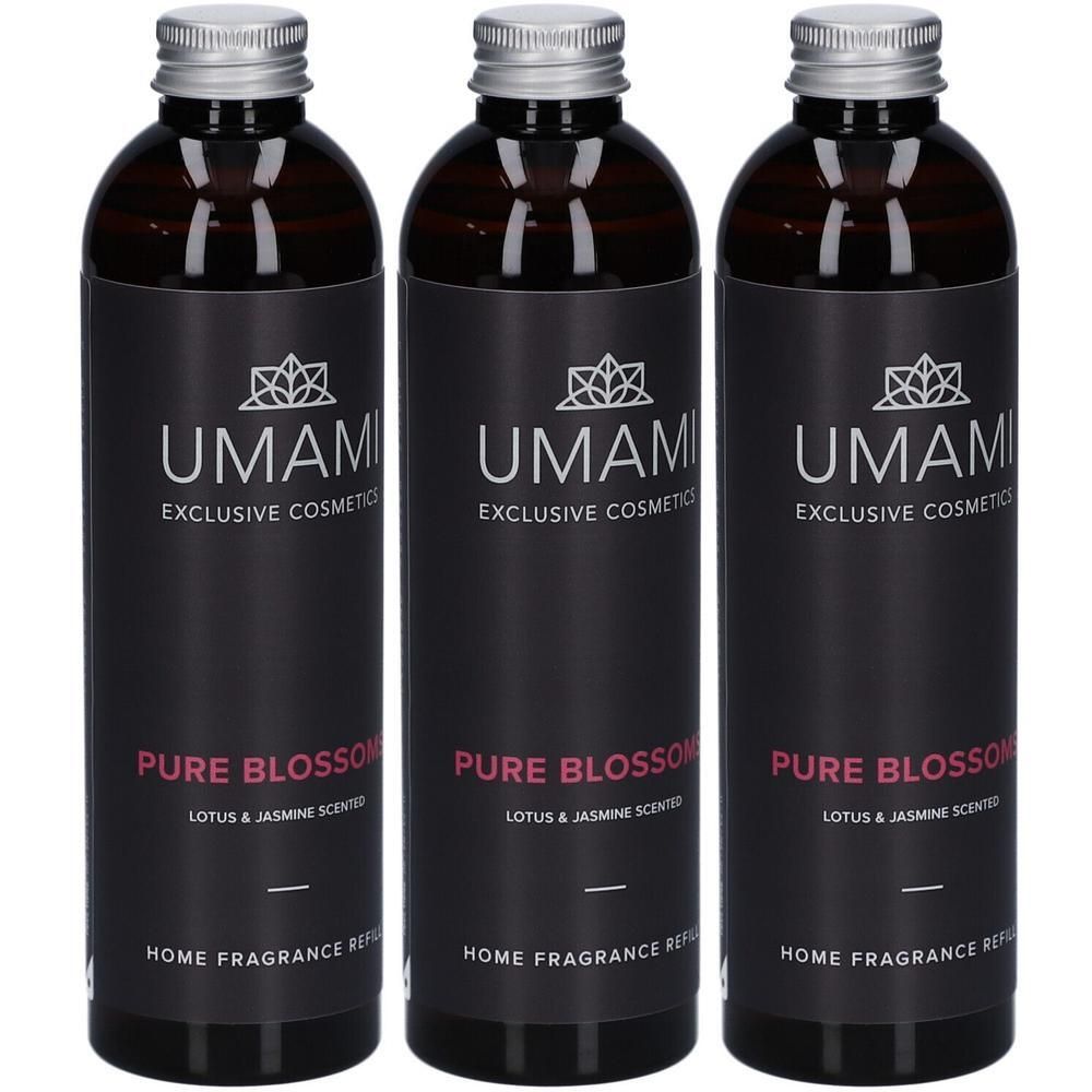 Drie flessen Umami Pure Blossom Lotus & Jasmin Home Fragrance Refill. Donkerbruine glazen flessen met zilveren doppen.