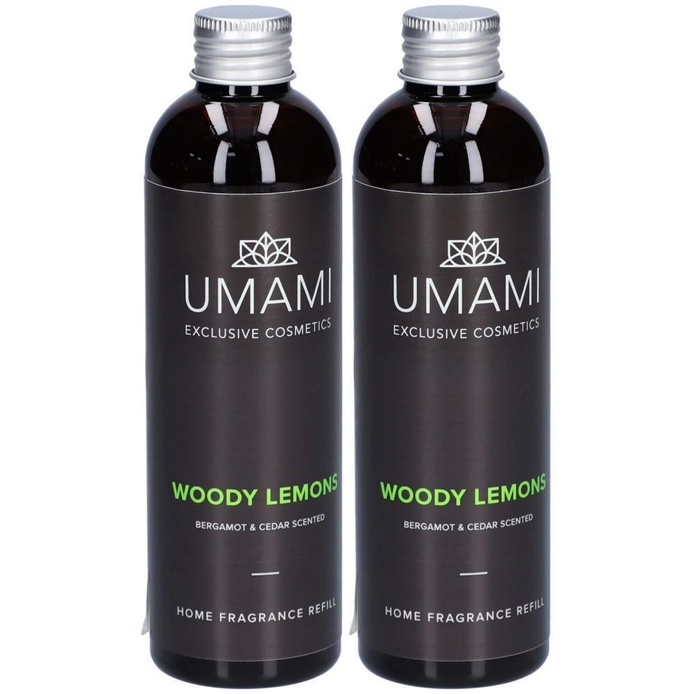 Twee flessen UMAMI Woody Lemons Home Fragrance Refill, Bergamot & Cedar geur.