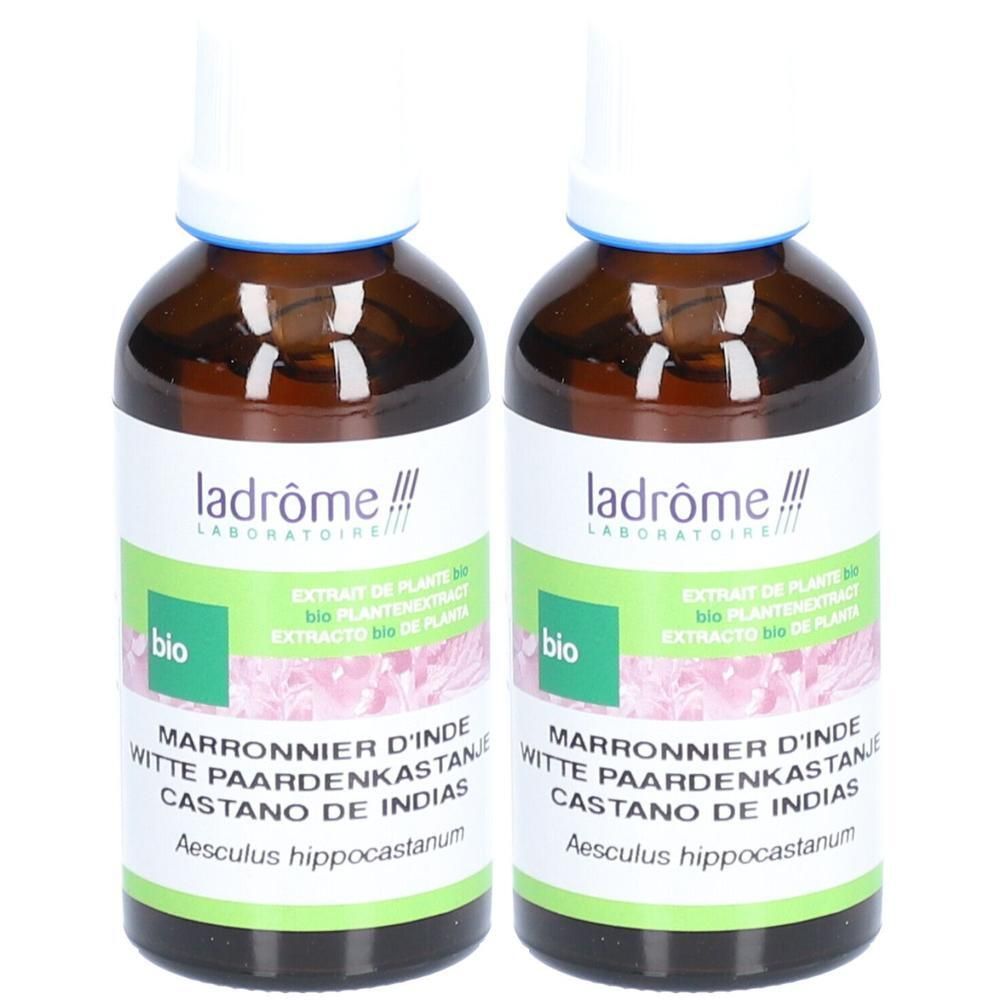 Twee flesjes Ladrôme Marronnier d'Inde Extract. Bruine glazen flesjes met witte etiketten en blauwe doppen.