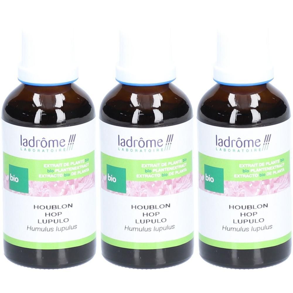 Trois flacons d'extrait de houblon Ladrôme. Flacons en verre brun avec bouchons et étiquettes blancs.