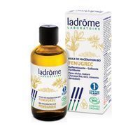 Ladrôme biologische fenegriekolie maceraat in glazen fles en doos. Met plantafbeeldingen en logo's.