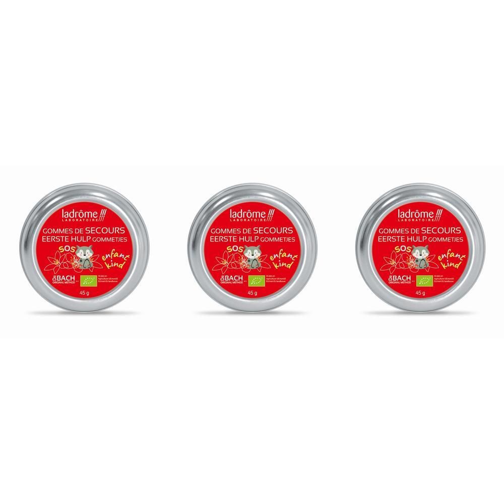 Drie ronde blikjes Ladrôme SOS Eerste Hulp Gummies voor kinderen. Rood etiket met bloemen en een dier. 45g.