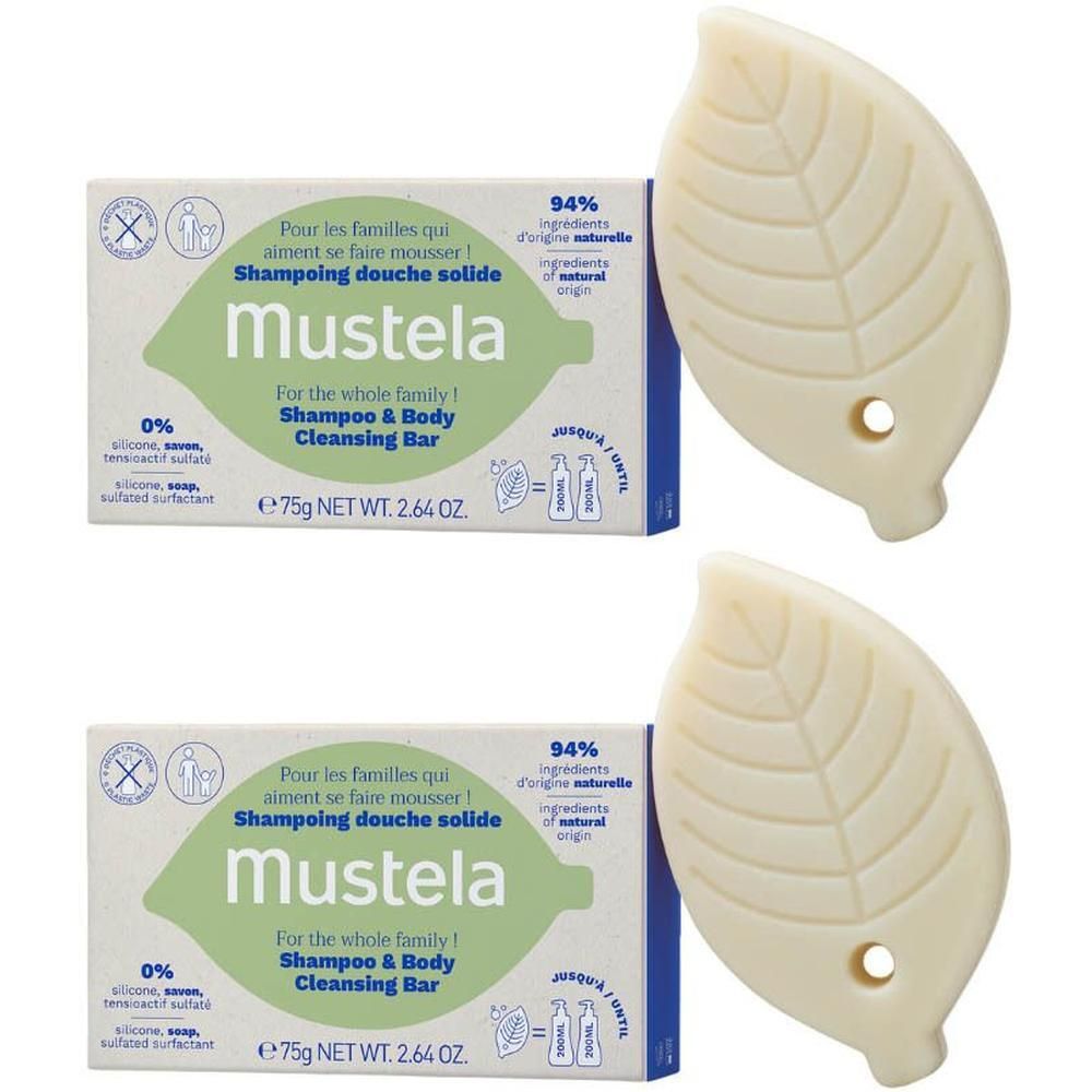 Deux pains solides Mustela Shampooing Douche en forme de feuille, emballés dans des boîtes.
