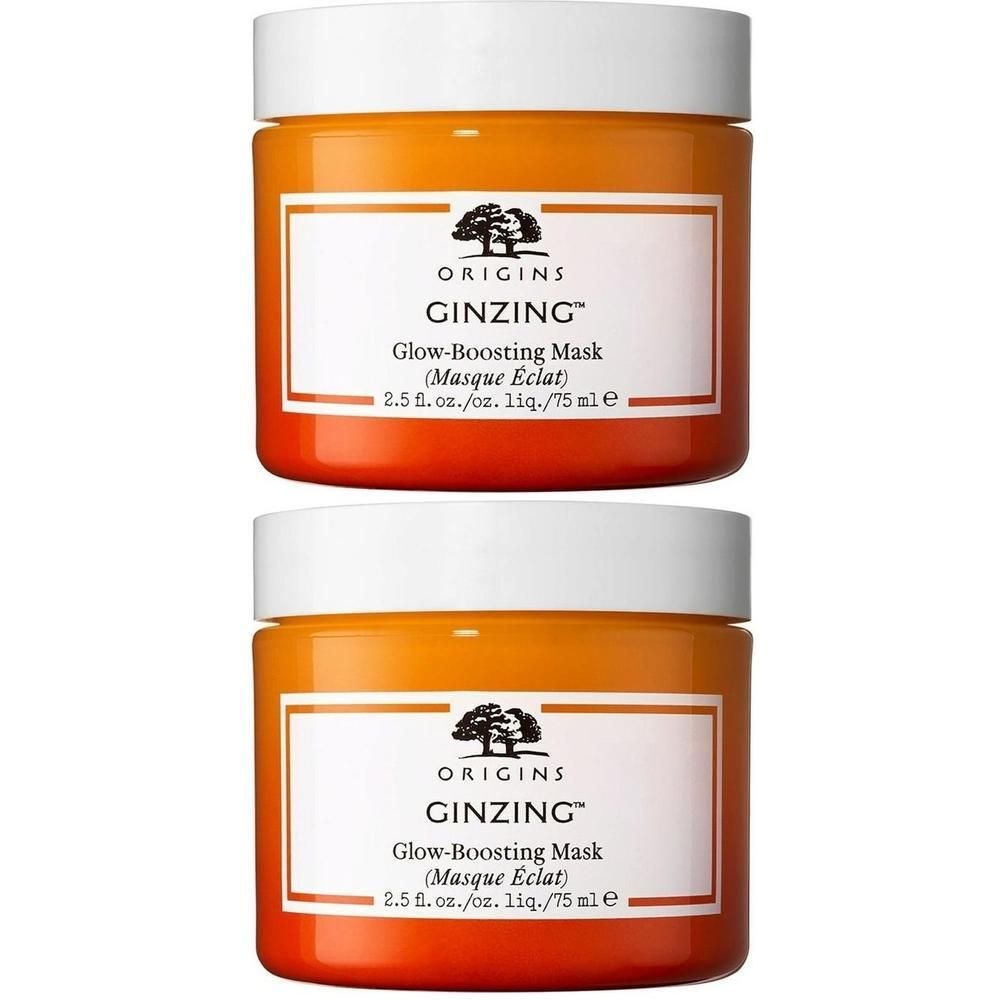 Twee ORIGINS GinZing gezichtsmaskers in oranje potjes met witte deksels.