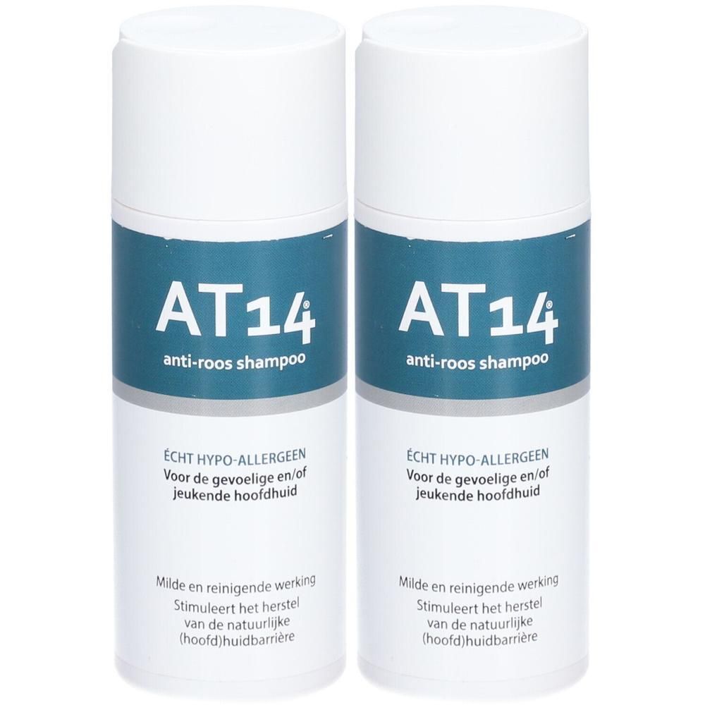 Twee flacons AT14 anti-roos shampoo. Hypoallergeen voor gevoelige hoofdhuid.