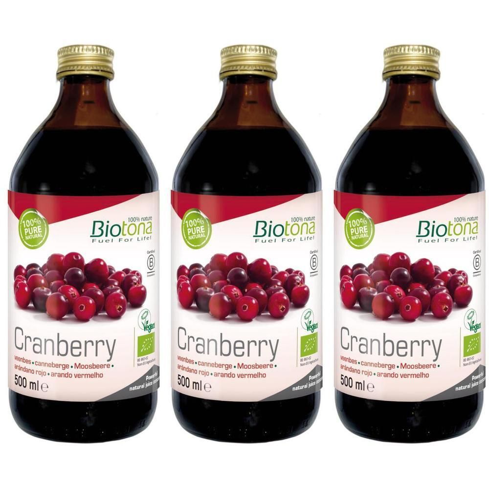 Trois bouteilles de Biotona Cranberry Bio Concentré avec cranberries et label bio.