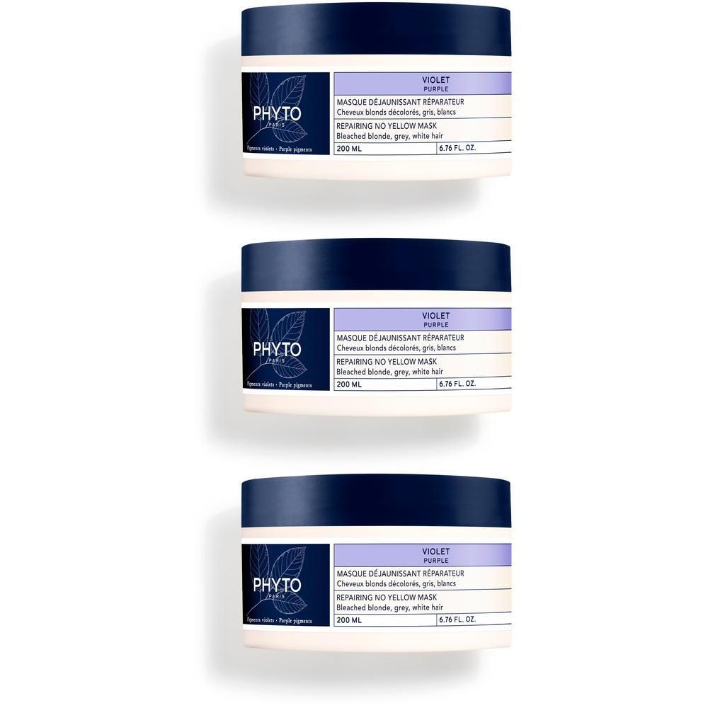 Drie Phyto Violet Masque Déjaunissant Réparateur potten met donkere deksels en etiketten.