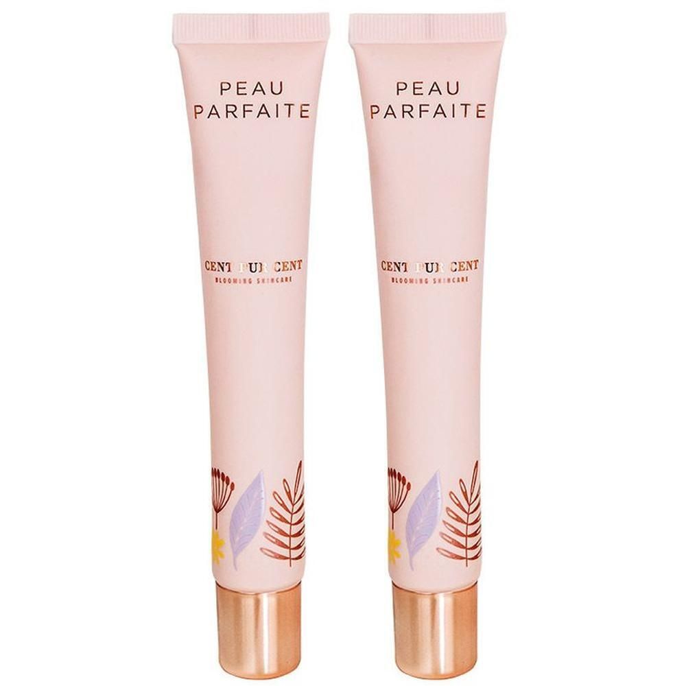Deux tubes roses à motif floral et bouchon doré. Inscriptions : PEAU PARFAITE, CENT PUR CENT.