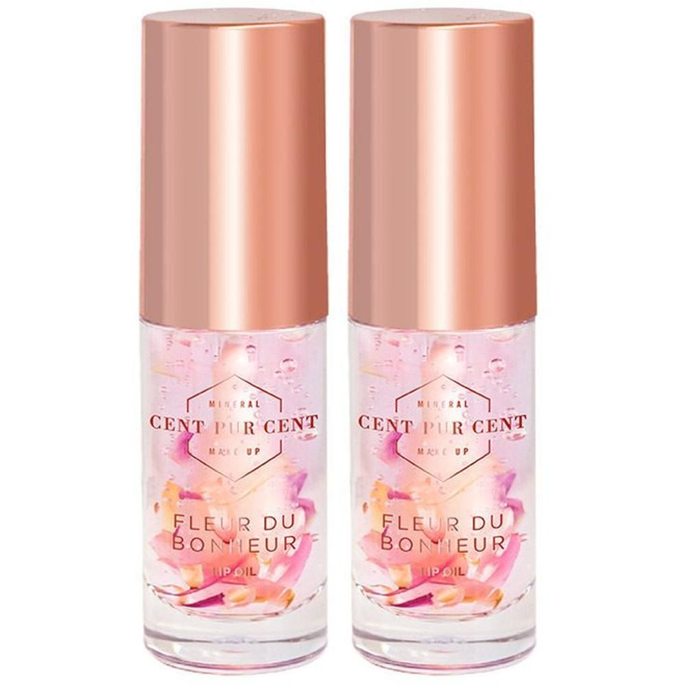 Deux flacons d'Huile à Lèvres Cent Pur Cent Fleur du Bonheur avec des pétales de rose à l'intérieur.