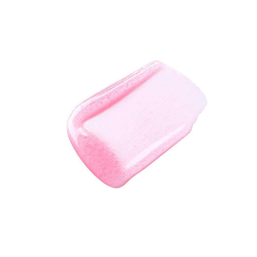 Een swatch van Cent Pur Cent Huile d'Amour lipolie in zachtroze kleur.