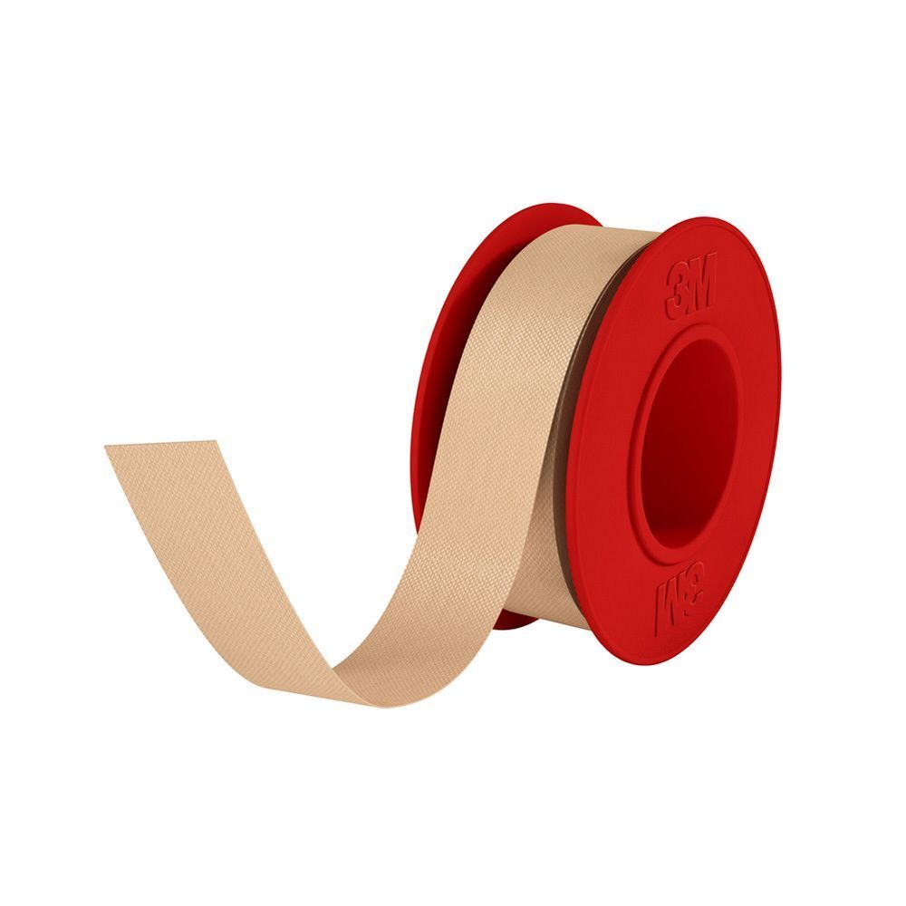 Nexcare ruban textile flexible beige sur une bobine rouge, un morceau déroulé.