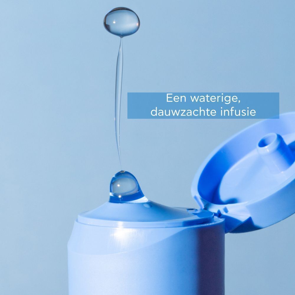 Druppel vloeistof die uit de geopende dop van Apivita Aqua Beelicious Toner valt.