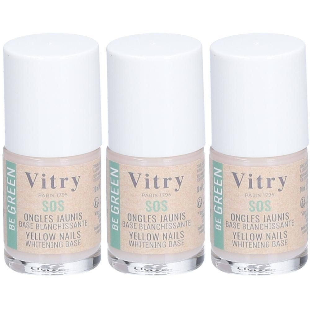 Trois flacons Vitry SOS Ongles Jaunis Base Blanchissante. Bouchons blancs, étiquettes avec accents verts et beiges.