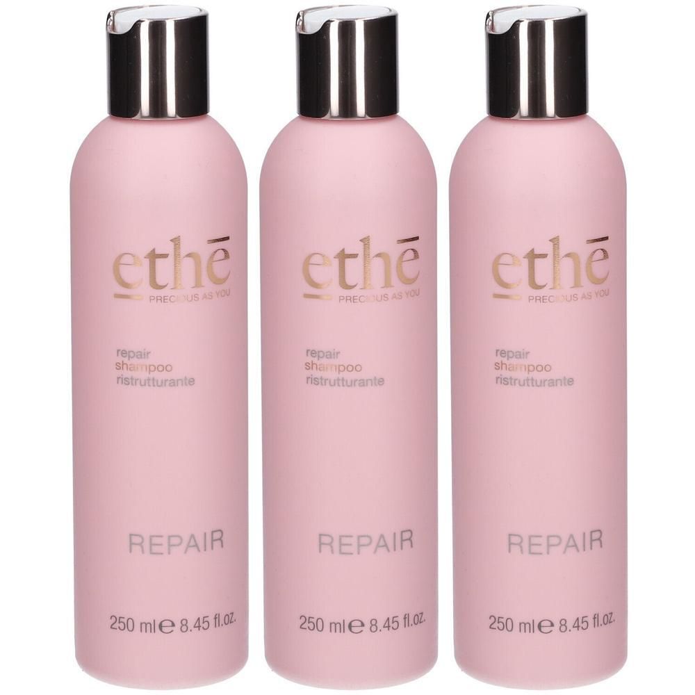 Trois flacons roses de shampooing réparateur ETHÈ, chacun de 250 ml.
